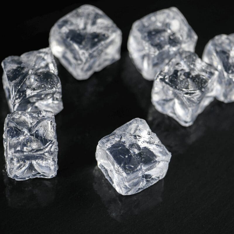 Cubes of ice on black table background Cubes of ice on black table background